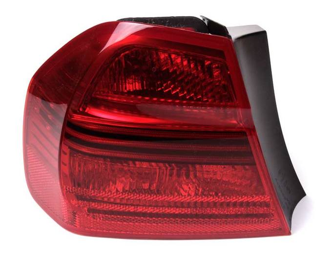 BMW Tail Light Assembly - Driver Side Outer 63217161955 - Hella 010083031